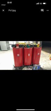 Industrial Red Transformers Ready for Recycling