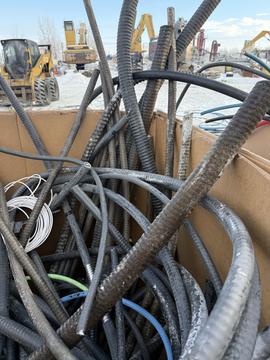 Efficient Scrap Metal Collection with Heavy Machinery in Saskatchewan