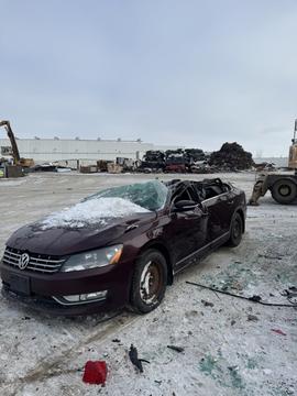 Damaged Car Ready for Scrap Metal Recycling in Snowy Yard