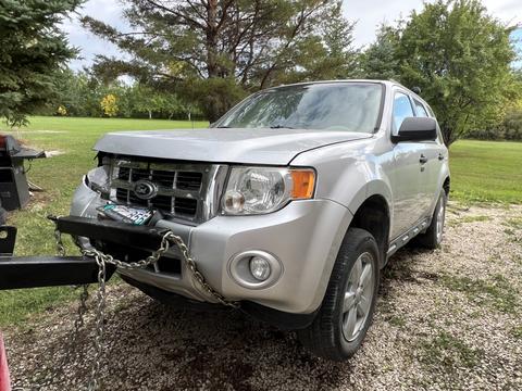 Damaged SUV Prepared for Scrap Metal Recycling Pickup