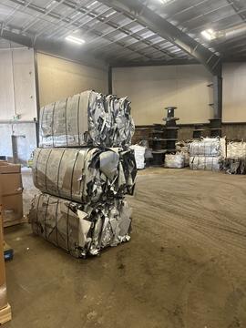 Stacked Scrap Metal Bales in Recycling Facility